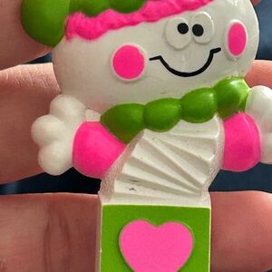 Avon Pink and Green Smiling Doll brooch
